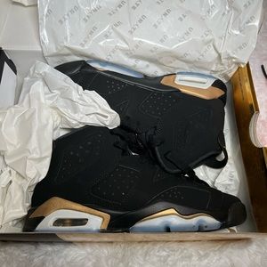 Jordan 6s black and gold